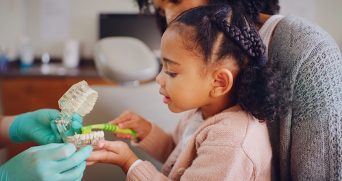 young girl at dentist visit