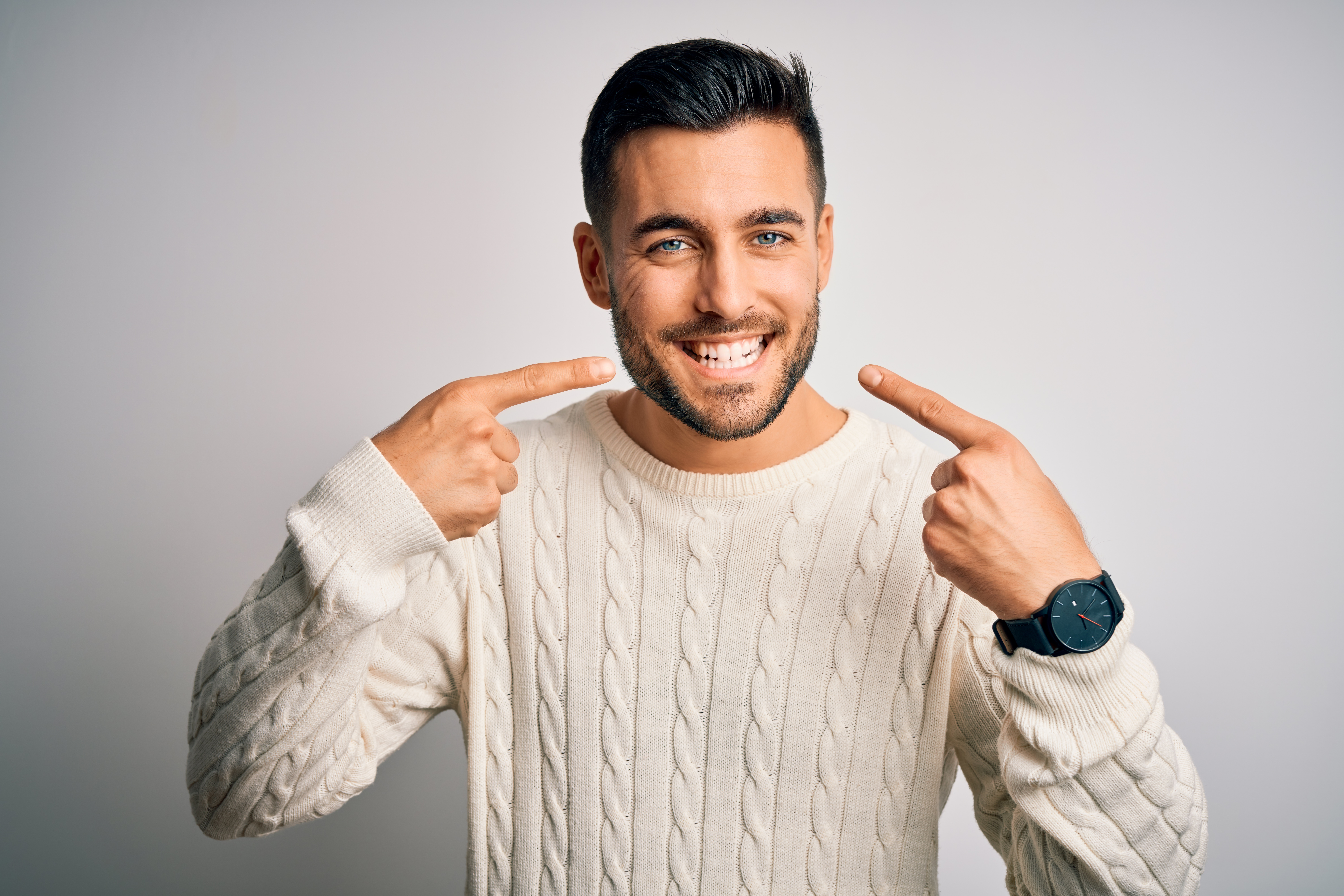 young man smiling with bright white teeth