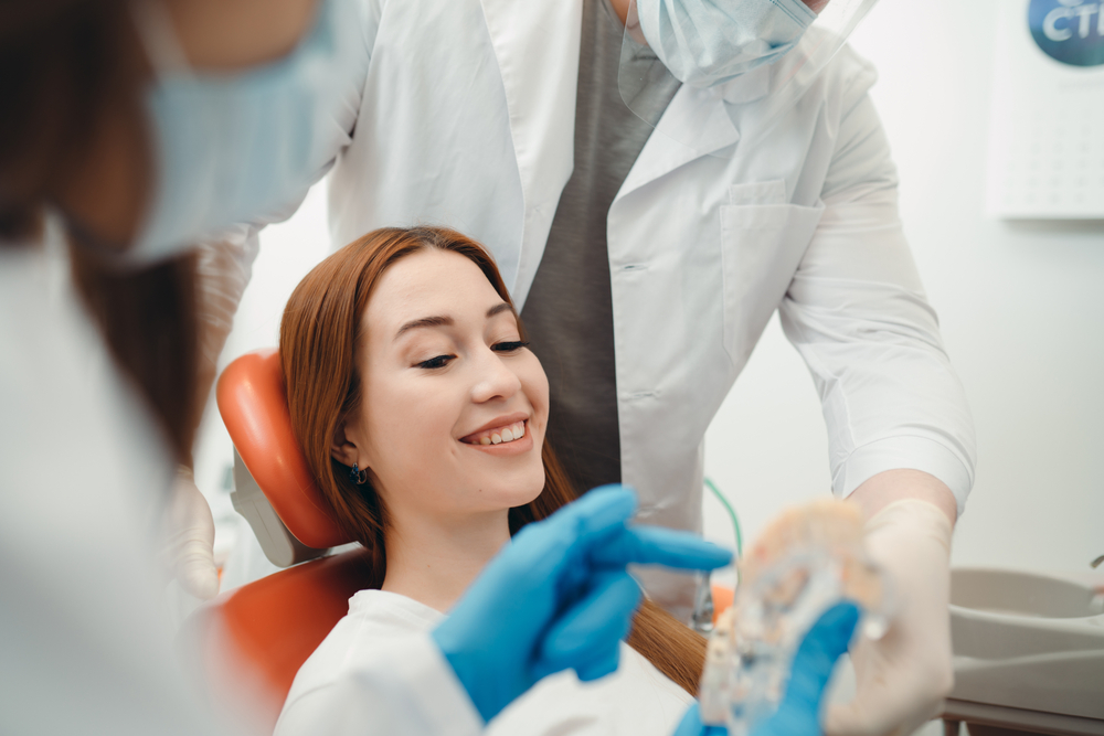 woman in dental office counseling on dental crown