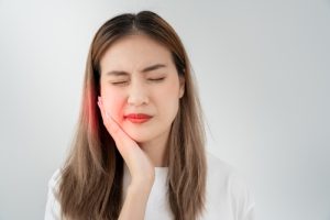 woman with tooth pain