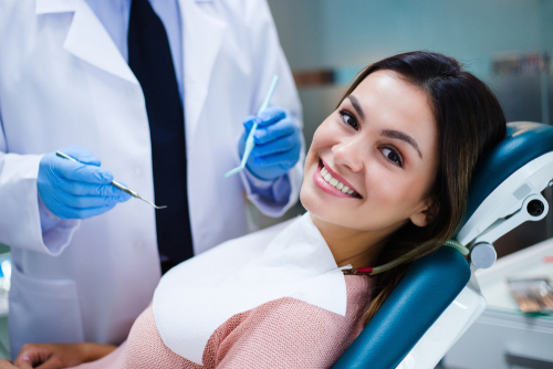 woman smiling in dental chair