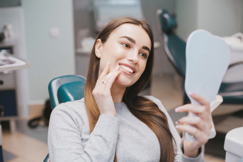 woman smiling in dental office