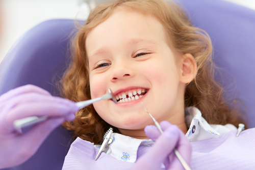 little girl at dentist office