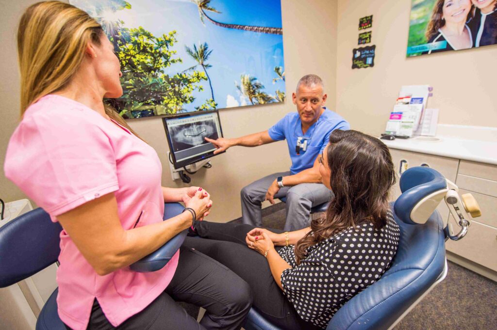 Dr. Nick Addario speaking to a patient